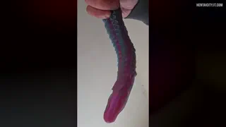 Don't even begin to think that this is some small, skinny, worthless tendril. As it smells and senses her secretions, it throbs and shakes, and doubles in size